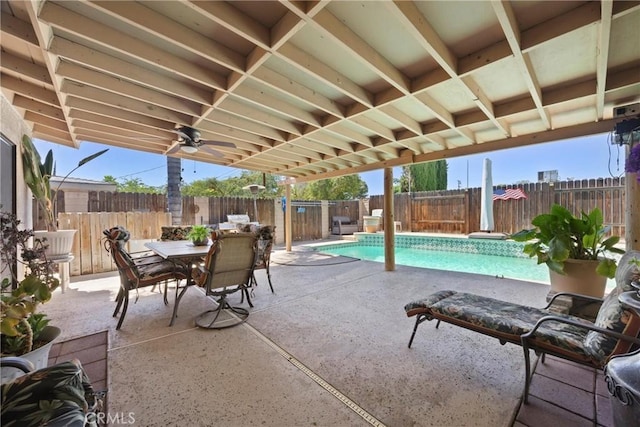 2818 Renegade Ave, Bakersfield, CA 93306 - fenced backyard with a patio and outdoor dining area