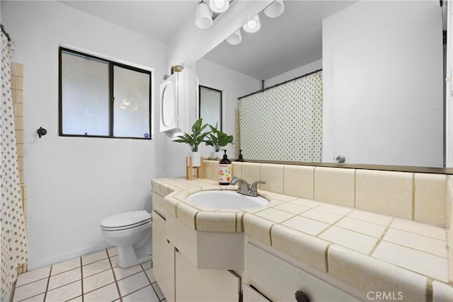 2818 Renegade Ave, Bakersfield, CA 93306 - full bathroom featuring vanity, curtained shower, and tile patterned flooring