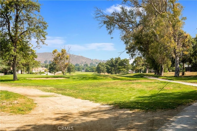 5731 Camino Real, Riverside, CA 92509 - surrounding community featuring a mountain view and a lawn