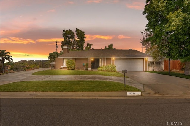 5731 Camino Real, Riverside, CA 92509 - single story home with concrete driveway and a garage