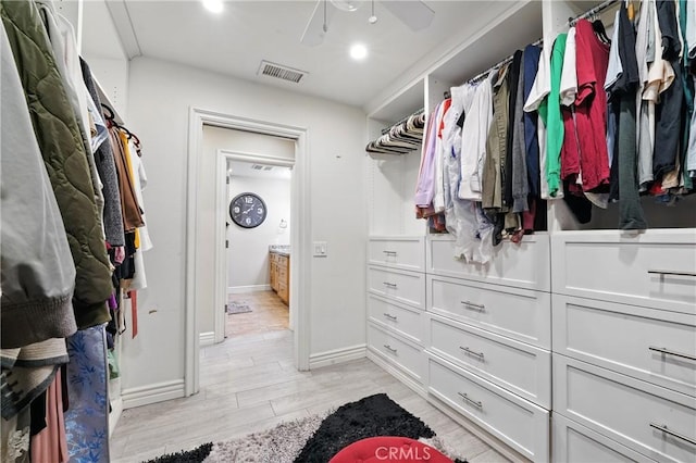 1817 Balboa Way, Upland, CA 91784 - walk in closet with light wood-style floors and ceiling fan