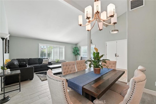 1817 Balboa Way, Upland, CA 91784 - dining area featuring a chandelier, light wood-type flooring, and high vaulted ceiling