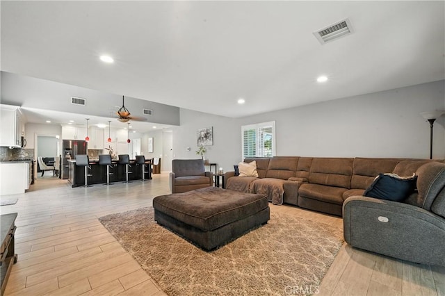 1817 Balboa Way, Upland, CA 91784 - living room with light wood-type flooring and recessed lighting