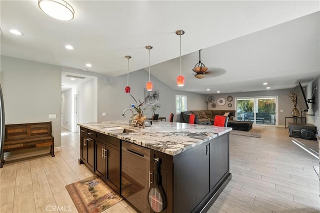 1817 Balboa Way, Upland, CA 91784 - kitchen featuring dishwasher, light wood-style flooring, open floor plan, light stone countertops, and recessed lighting