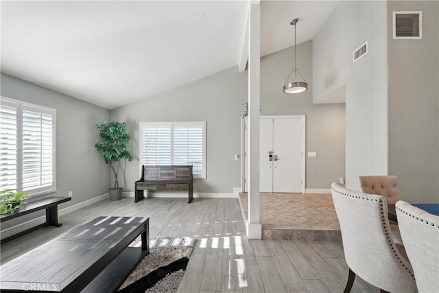 1817 Balboa Way, Upland, CA 91784 - living area featuring plenty of natural light, wood finished floors, and high vaulted ceiling