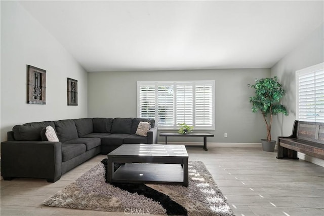 1817 Balboa Way, Upland, CA 91784 - living area featuring light wood-style floors and lofted ceiling