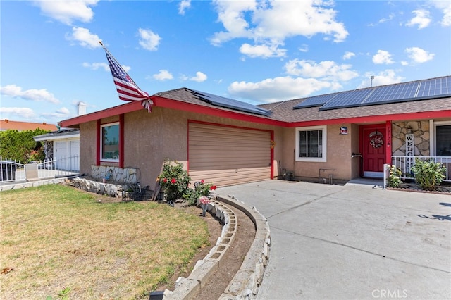 19121 Galatina St, Rowland Heights, CA 91748 - ranch-style house with stucco siding, a garage, concrete driveway, a front yard, and roof mounted solar panels