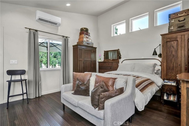 21018 Yankee Valley Rd, Hidden Valley Lake, CA 95467 - bedroom with a wall unit AC, multiple windows, dark wood-type flooring, and recessed lighting