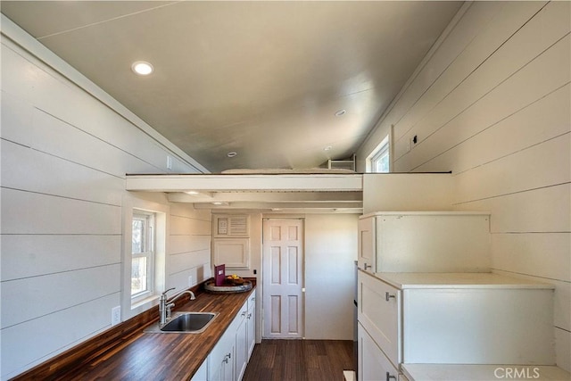 21018 Yankee Valley Rd, Hidden Valley Lake, CA 95467 - kitchen featuring wood counters, dark wood-style flooring, white cabinetry, recessed lighting, and wooden walls