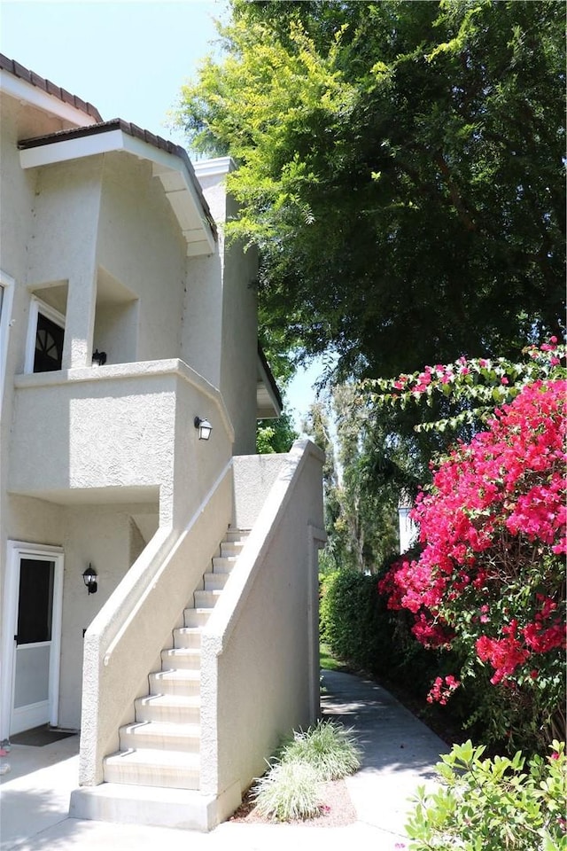 80 Greenmoor Unit 40, Irvine, CA 92614 - doorway to property featuring stucco siding