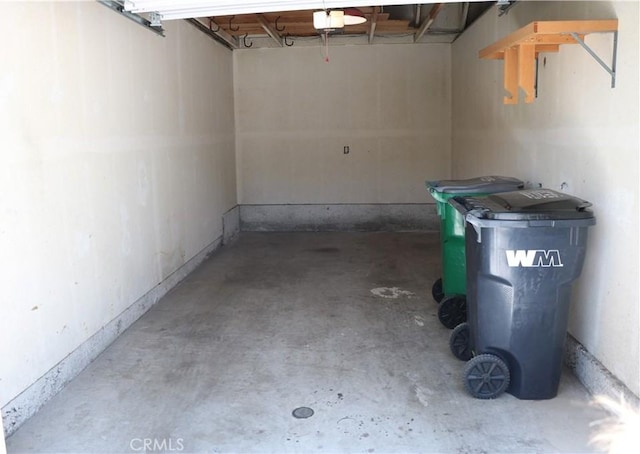 80 Greenmoor Unit 40, Irvine, CA 92614 - garage featuring a garage door opener