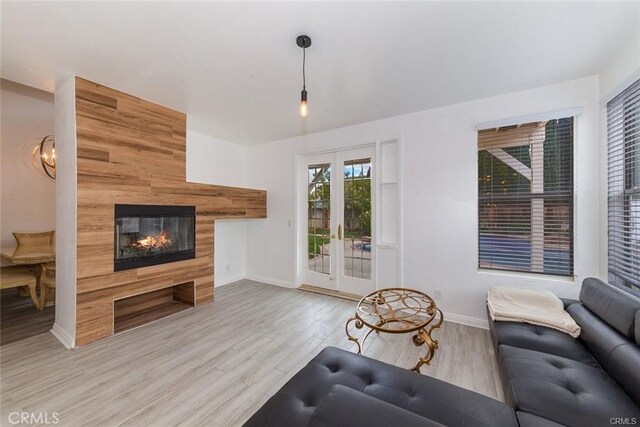 38742 Berrycreek Ct, Palmdale, CA 93551 - living area with wood finished floors and a multi sided fireplace