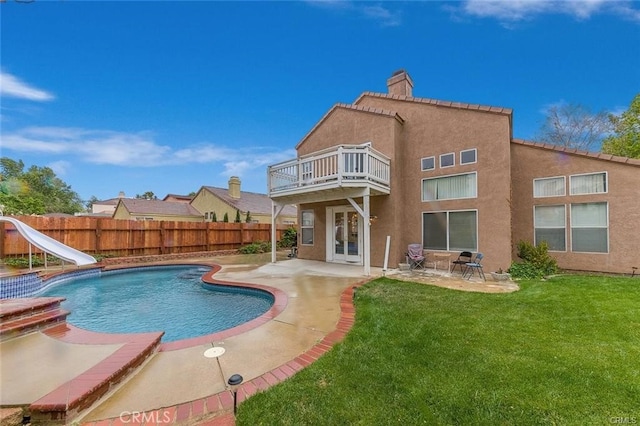 38742 Berrycreek Ct, Palmdale, CA 93551 - view of swimming pool with a water slide, a fenced backyard, and a patio