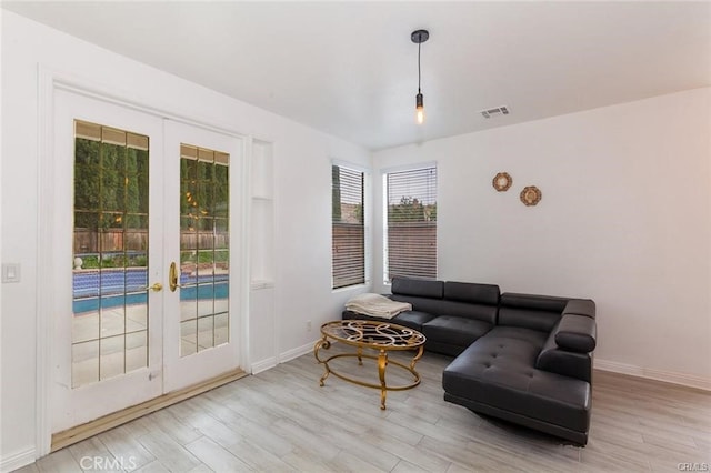 38742 Berrycreek Ct, Palmdale, CA 93551 - living room with french doors and wood finished floors