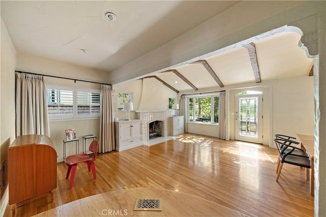 1911 Pepper Dr, Altadena, CA 91001 - living area with wood finished floors and a fireplace with flush hearth