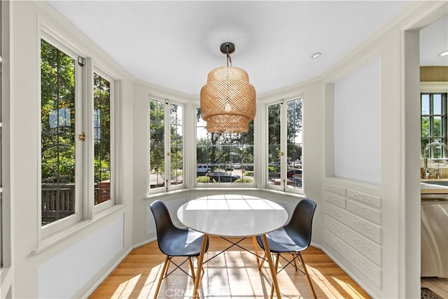 1911 Pepper Dr, Altadena, CA 91001 - sunroom / solarium featuring wood finished floors, plenty of natural light, crown molding, and french doors