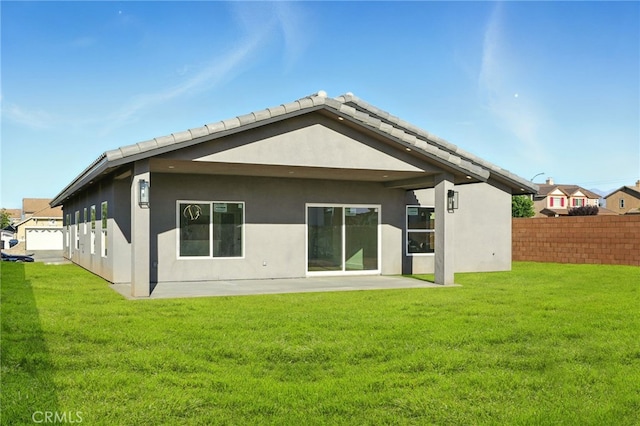 36733 42nd St E, Palmdale, CA 93552 - rear view of house with stucco siding and a patio