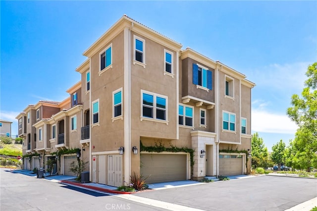 109 Alder Rdg, Lake Forest, CA 92610 - view of building exterior with an attached garage