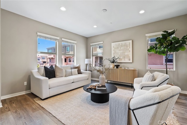 109 Alder Rdg, Lake Forest, CA 92610 - living room with healthy amount of natural light, wood finished floors, and recessed lighting