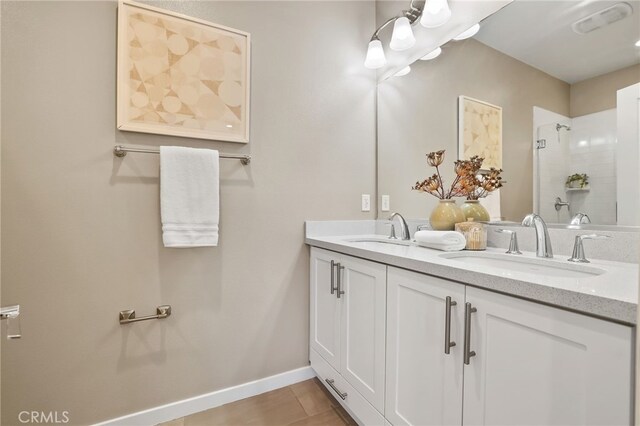 109 Alder Rdg, Lake Forest, CA 92610 - bathroom with double vanity and a shower with door