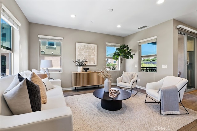 109 Alder Rdg, Lake Forest, CA 92610 - living room with wood finished floors, recessed lighting, and radiator heating unit