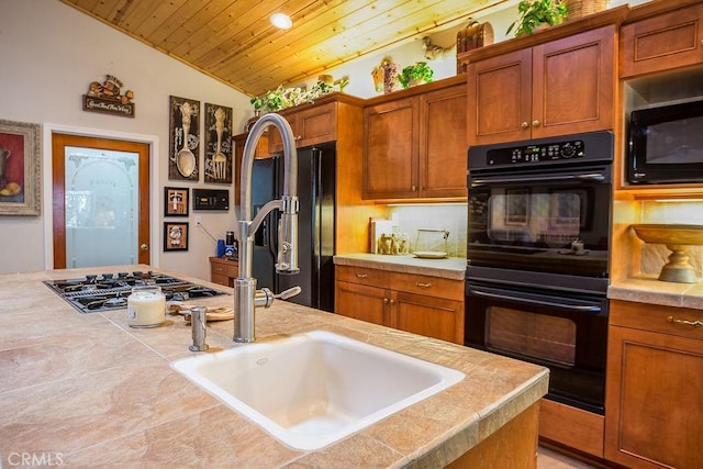 1613 Lassen Way, Pine Mountain Club, CA 93222 - kitchen with black appliances, wooden ceiling, lofted ceiling, and brown cabinets