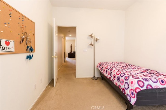 2207 Rockrose St, Palmdale, CA 93551 - bedroom featuring light colored carpet and baseboards
