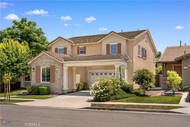 6585 Youngstown St, Chino, CA 91710 - traditional home with an attached garage, driveway, a tiled roof, and stucco siding