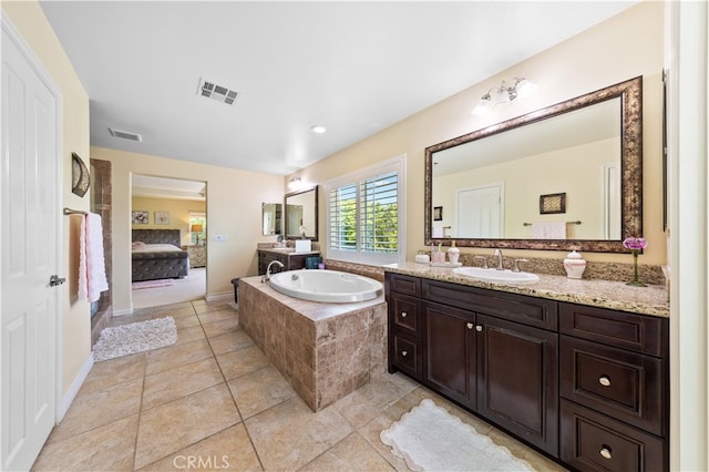 6585 Youngstown St, Chino, CA 91710 - bathroom with a garden tub, vanity, ensuite bath, and tile patterned flooring