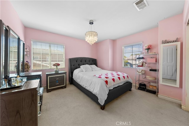 6585 Youngstown St, Chino, CA 91710 - bedroom featuring light colored carpet and a chandelier