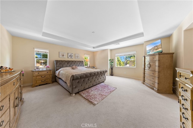 6585 Youngstown St, Chino, CA 91710 - bedroom featuring a tray ceiling and light colored carpet
