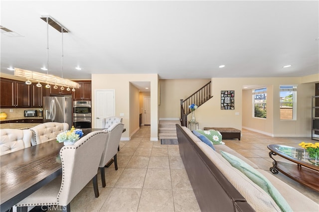 6585 Youngstown St, Chino, CA 91710 - dining room with stairway, light tile patterned floors, and recessed lighting