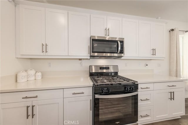 347 Carson Ct, Rialto, CA 92376 - kitchen featuring appliances with stainless steel finishes, white cabinetry, and light countertops