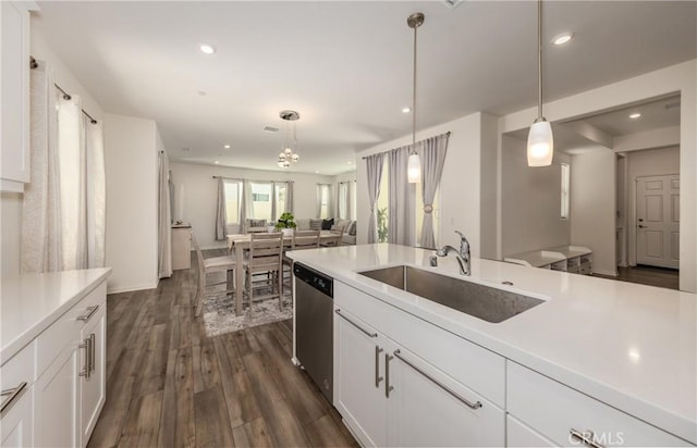 347 Carson Ct, Rialto, CA 92376 - kitchen featuring dishwasher, open floor plan, light countertops, dark wood-style flooring, and recessed lighting
