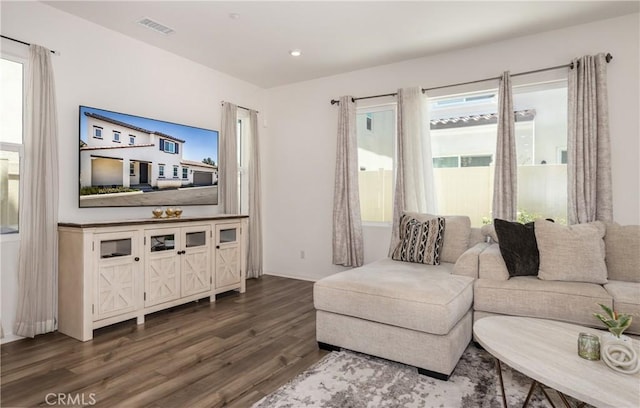 347 Carson Ct, Rialto, CA 92376 - living area featuring dark wood finished floors, plenty of natural light, and recessed lighting