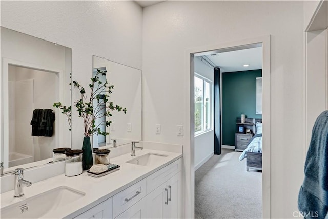 17148 Kent St, Hesperia, CA 92345 - bathroom featuring double vanity and connected bathroom