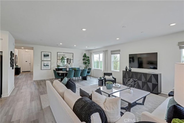 17148 Kent St, Hesperia, CA 92345 - living room with light wood finished floors and recessed lighting