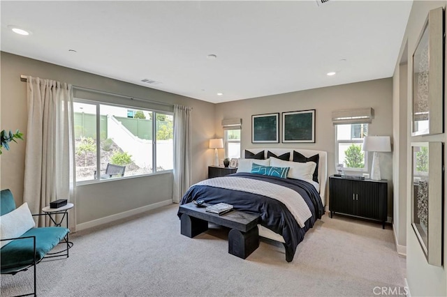 17148 Kent St, Hesperia, CA 92345 - bedroom featuring multiple windows, light carpet, and recessed lighting