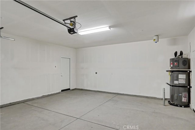 17148 Kent St, Hesperia, CA 92345 - garage featuring water heater and a garage door opener