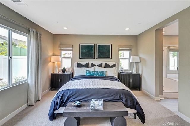 17148 Kent St, Hesperia, CA 92345 - bedroom featuring multiple windows, light carpet, recessed lighting, and ensuite bathroom