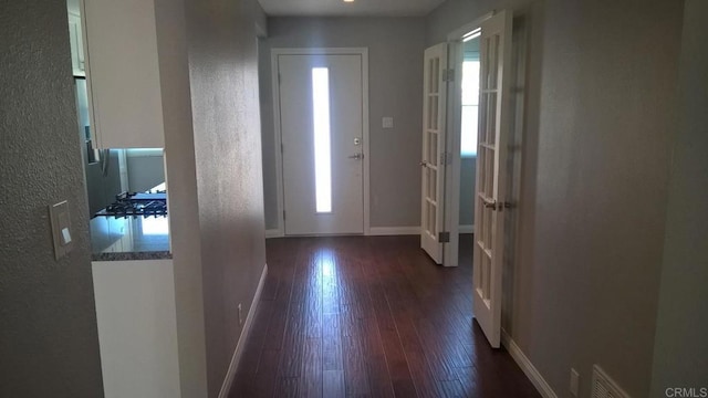 3732 Mira Pacific Dr, Oceanside, CA 92056 - foyer featuring dark wood-style floors and a textured wall