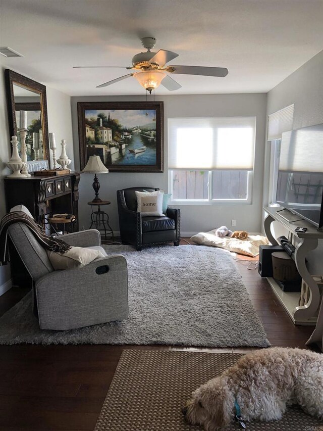 3732 Mira Pacific Dr, Oceanside, CA 92056 - living area with a ceiling fan and wood finished floors