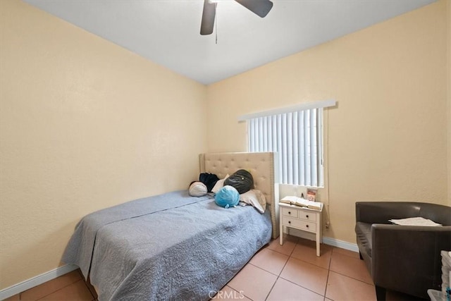1148 E 43rd, Los Angeles, CA 90011 - bedroom featuring light tile patterned flooring and a ceiling fan