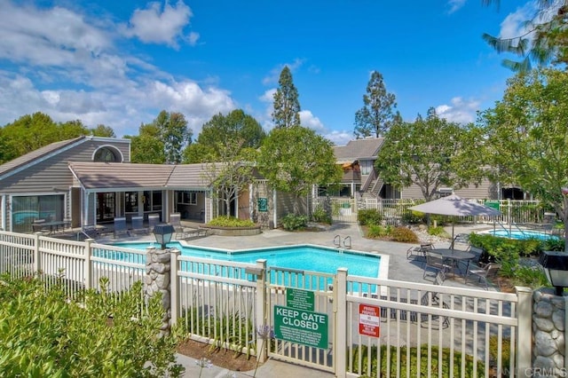 1087 Shadowridge Dr Unit 101, Vista, CA 92081 - community pool featuring a patio
