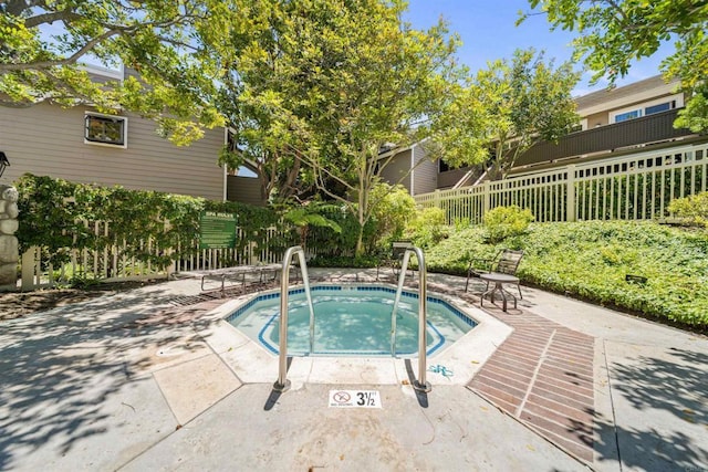 1087 Shadowridge Dr Unit 101, Vista, CA 92081 - view of pool with a hot tub and a patio area
