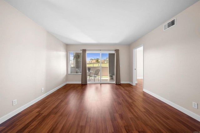 1087 Shadowridge Dr Unit 101, Vista, CA 92081 - empty room featuring baseboards and wood finished floors