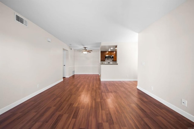 1087 Shadowridge Dr Unit 101, Vista, CA 92081 - unfurnished living room with a ceiling fan and dark wood finished floors