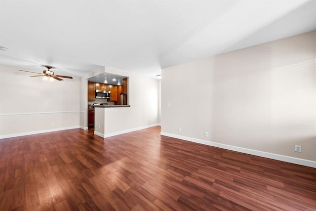 1087 Shadowridge Dr Unit 101, Vista, CA 92081 - unfurnished living room with dark wood finished floors and ceiling fan