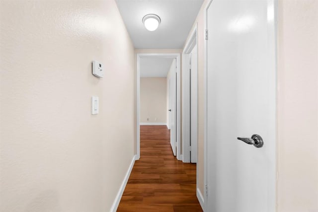 1087 Shadowridge Dr Unit 101, Vista, CA 92081 - hall featuring wood finished floors and baseboards