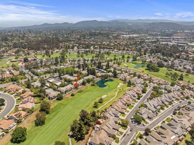 1087 Shadowridge Dr Unit 101, Vista, CA 92081 - aerial overview of property's location with nearby suburban area and a water and mountain view